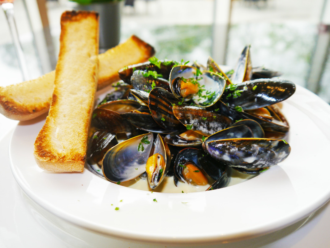 West country mussels cooked in a white wine and garlic butter sauce, served with chunky chips and crusty bread